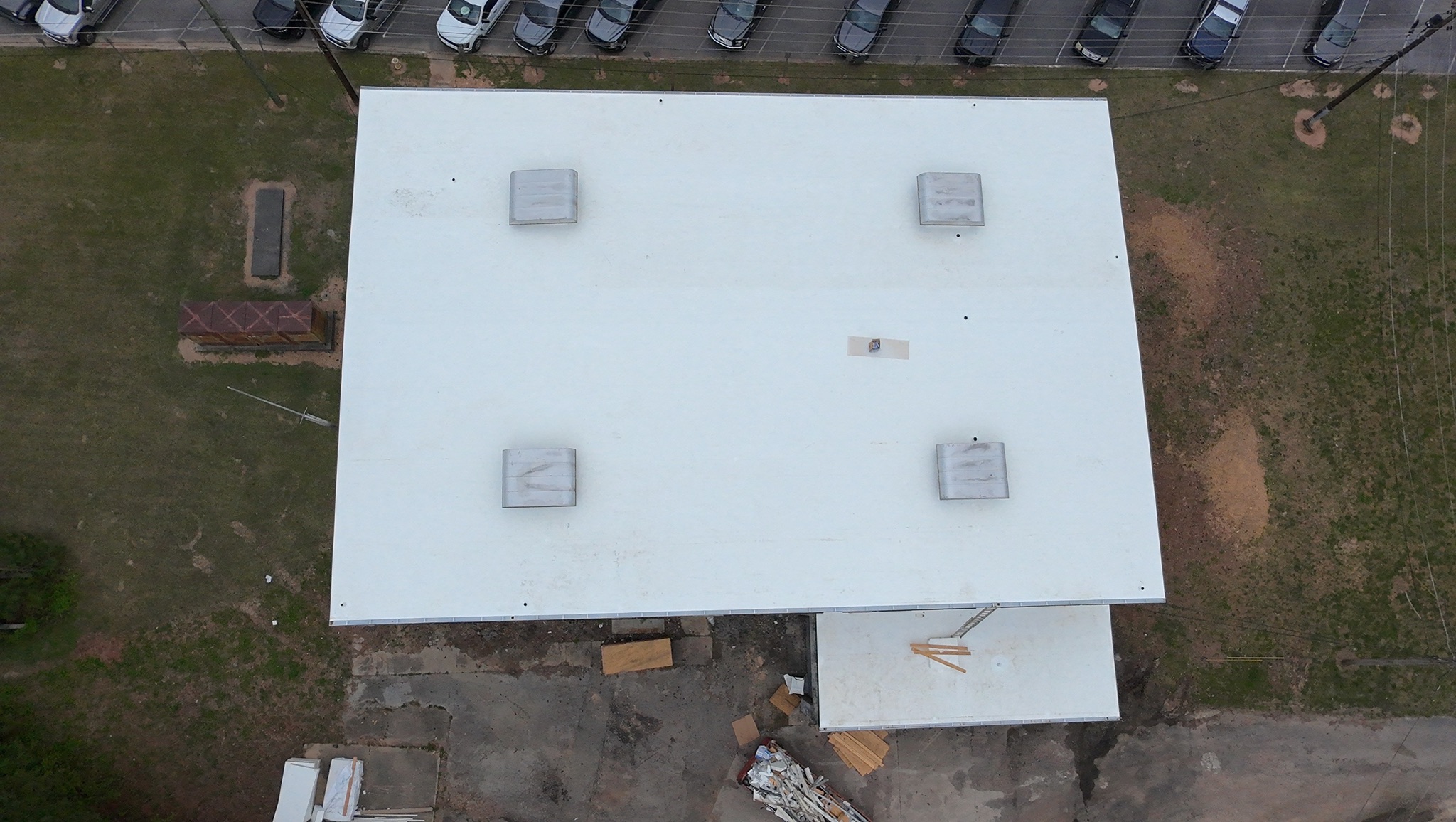 Finished 9,600 sq ft white Duro-Last PVC commercial roof in Anniston, Alabama
